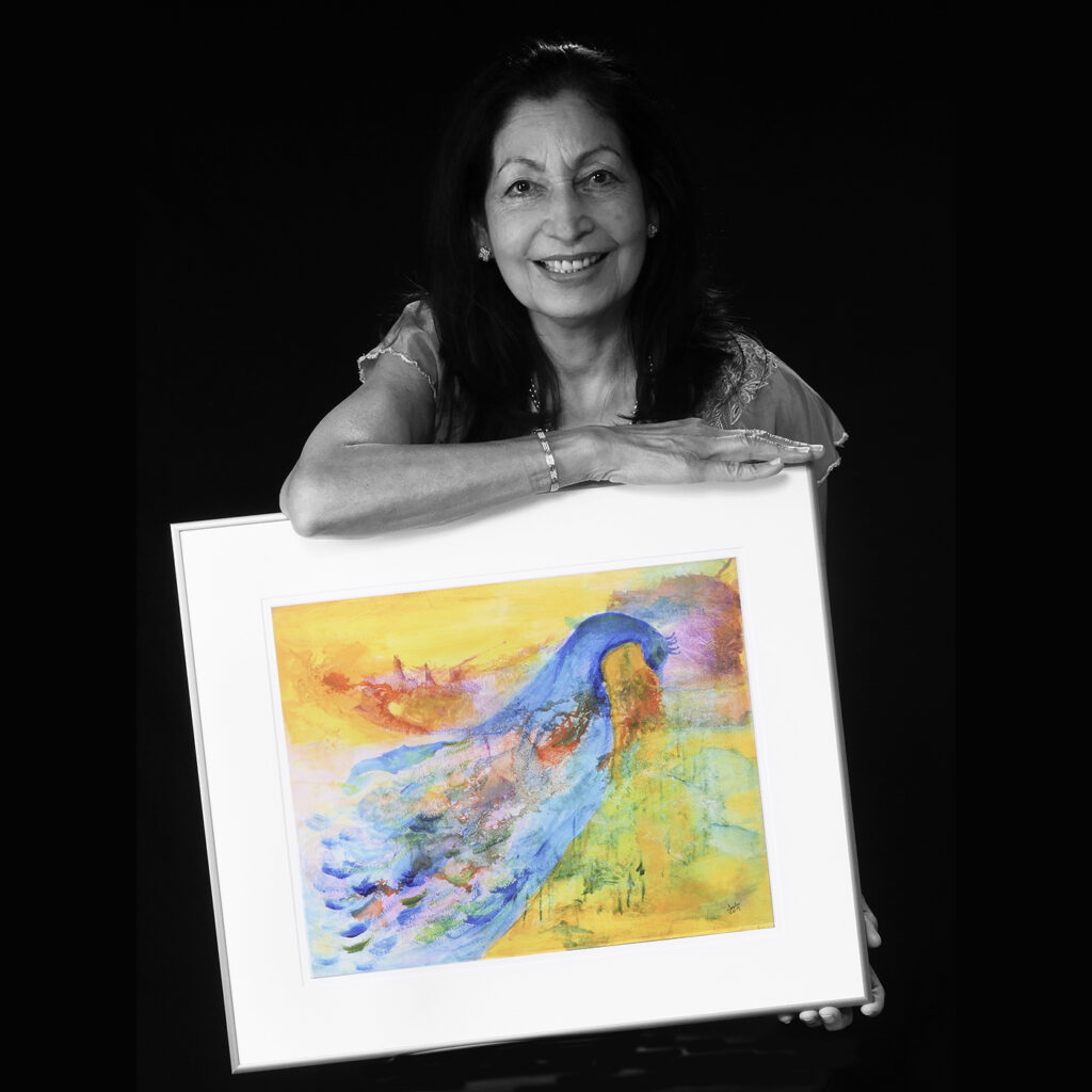 Indu Varma holding artwork