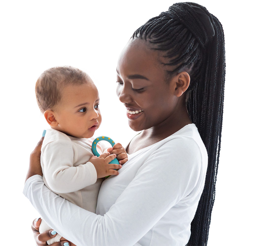Woman smiling and holding a baby